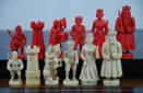German Red and White Figural Ivory Set, Mid-19th Century